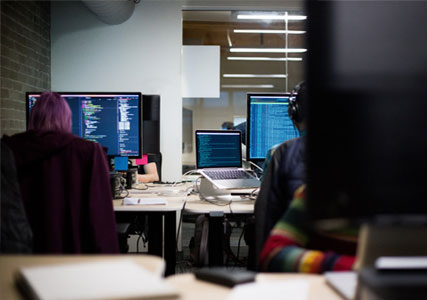 people sitting on there work desk